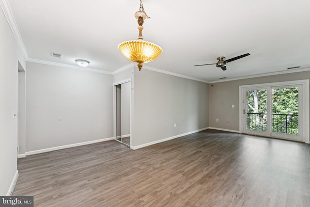 18330 Streamside Dr Unit 303, Gaithersburg, MD 20879 - unfurnished room featuring crown molding, wood finished floors, and a ceiling fan