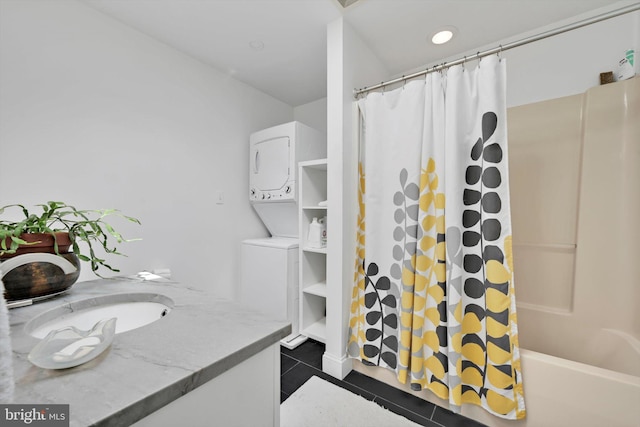 1622 Delaware Ave, Wyomissing, PA 19610 - bathroom featuring stacked washer / dryer, tile patterned floors, vanity, and shower / tub combo with curtain