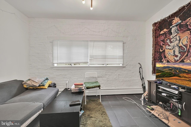1622 Delaware Ave, Wyomissing, PA 19610 - living room featuring dark tile patterned flooring and a baseboard heating unit