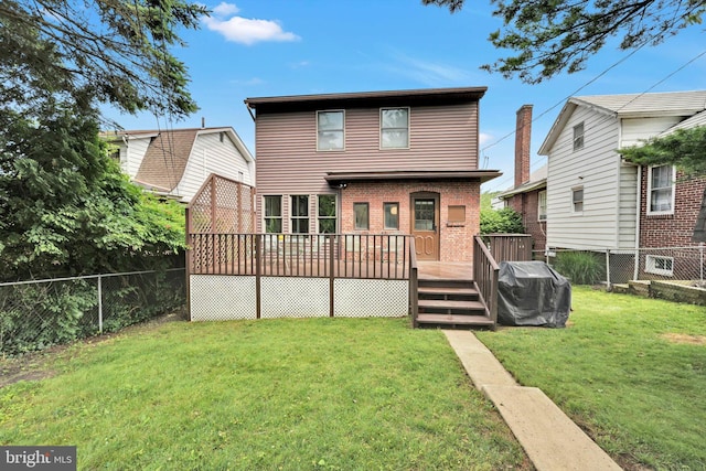 1622 Delaware Ave, Wyomissing, PA 19610 - rear view of property featuring a fenced backyard, a wooden deck, and brick siding