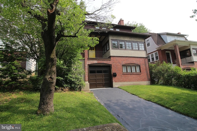 1622 Delaware Ave, Wyomissing, PA 19610 - view of front of home with asphalt driveway, a front lawn, brick siding, an attached garage, and a balcony