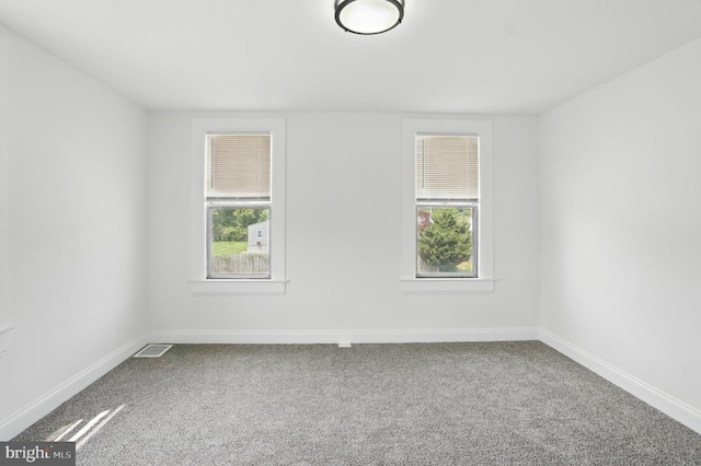 2105 Maisel St, Baltimore, MD 21230 - empty room with carpet floors and baseboards