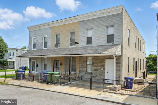 2105 Maisel St, Baltimore, MD 21230 - multi unit property featuring a porch, a gate, and cooling unit