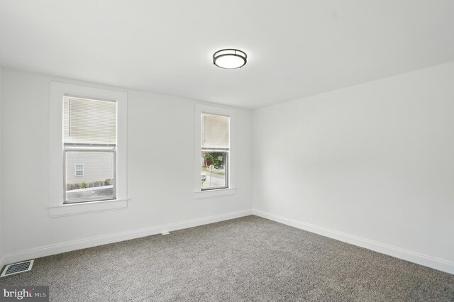 2105 Maisel St, Baltimore, MD 21230 - empty room featuring carpet floors and baseboards