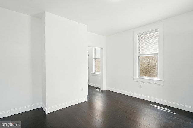 2105 Maisel St, Baltimore, MD 21230 - spare room featuring healthy amount of natural light and dark wood finished floors