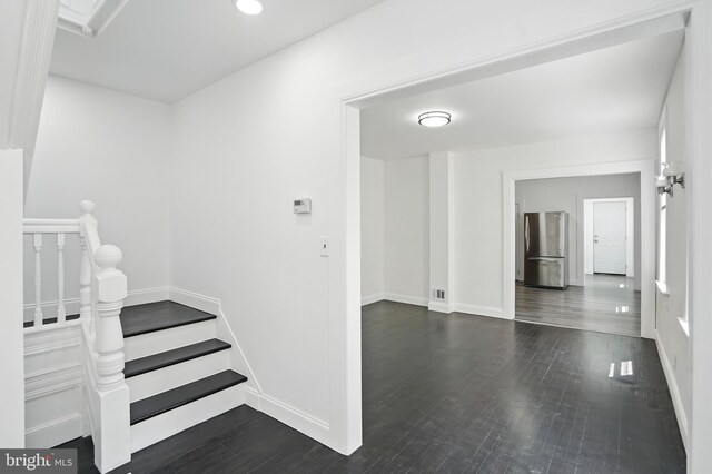 2105 Maisel St, Baltimore, MD 21230 - stairway with baseboards and wood finished floors