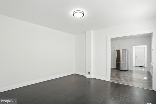 2105 Maisel St, Baltimore, MD 21230 - unfurnished room featuring dark wood finished floors and baseboards