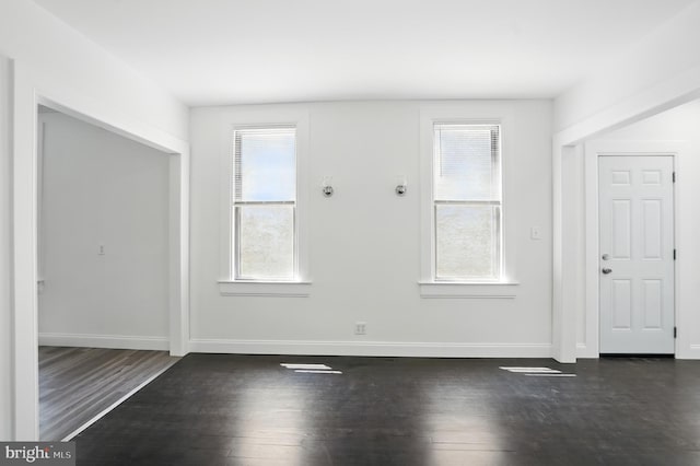 2105 Maisel St, Baltimore, MD 21230 - entryway featuring dark wood-type flooring and baseboards