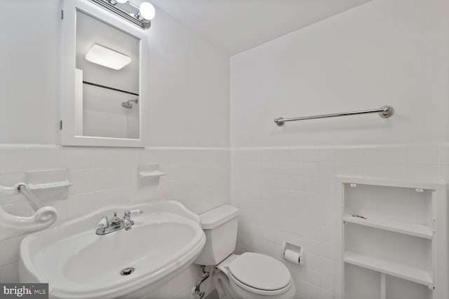 4201 Cathedral Ave NW Unit 303E, Washington, DC 20016 - bathroom featuring tile walls and wainscoting