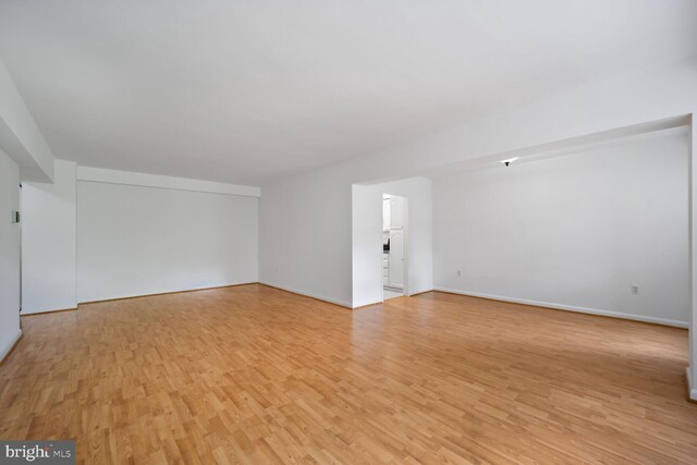 4201 Cathedral Ave NW Unit 303E, Washington, DC 20016 - unfurnished living room with light wood-style floors