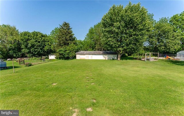 3324 Golf Course Rd, Allentown, PA 18104 - view of grassy yard with a playground