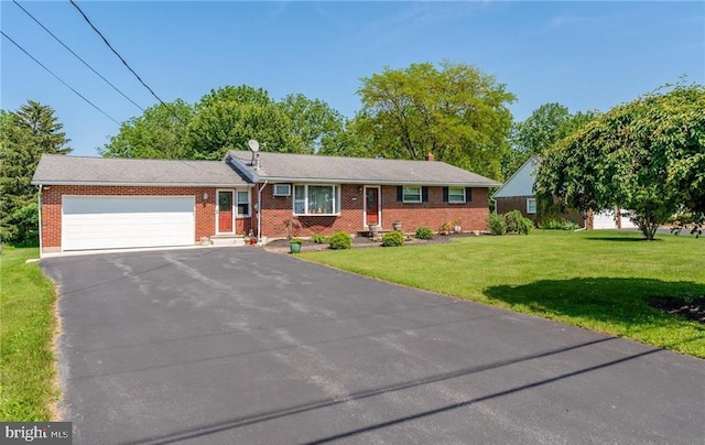 3324 Golf Course Rd, Allentown, PA 18104 - single story home with driveway, a garage, brick siding, and a front lawn