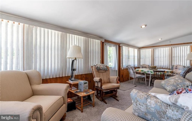 3324 Golf Course Rd, Allentown, PA 18104 - living area with carpet floors, lofted ceiling, and wooden walls