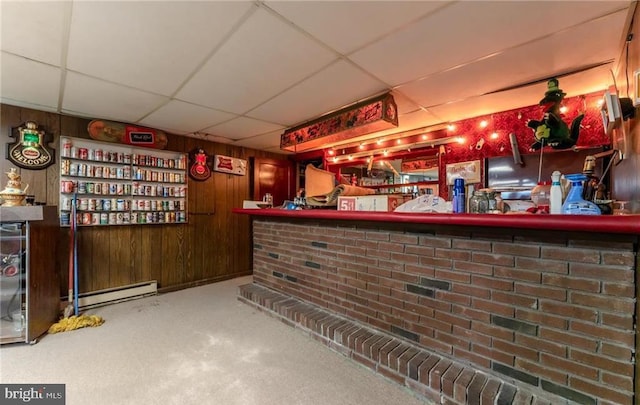 3324 Golf Course Rd, Allentown, PA 18104 - bar featuring a baseboard radiator, a paneled ceiling, and wooden walls
