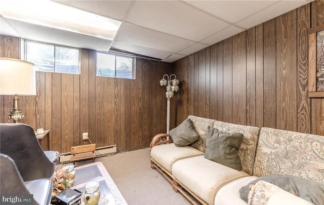 3324 Golf Course Rd, Allentown, PA 18104 - carpeted living area featuring wooden walls and a baseboard radiator