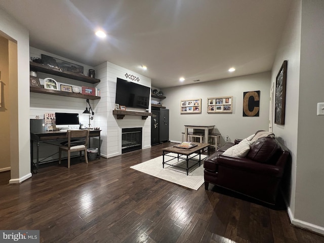 13755 Tides St, Woodbridge, VA 22191 - living room with recessed lighting, wood finished floors, and a glass covered fireplace