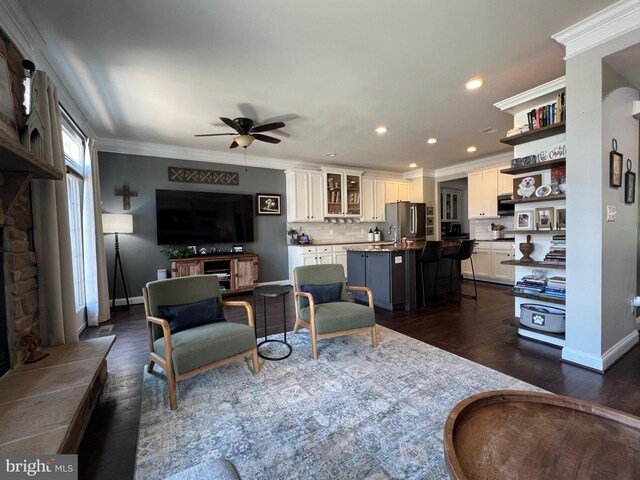 13755 Tides St, Woodbridge, VA 22191 - living room with a ceiling fan, recessed lighting, dark wood-style flooring, and crown molding
