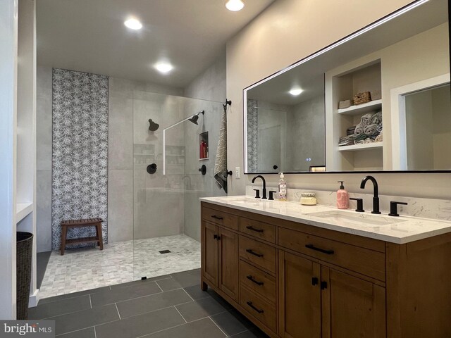 13755 Tides St, Woodbridge, VA 22191 - full bath with double vanity, a shower stall, and tile patterned flooring