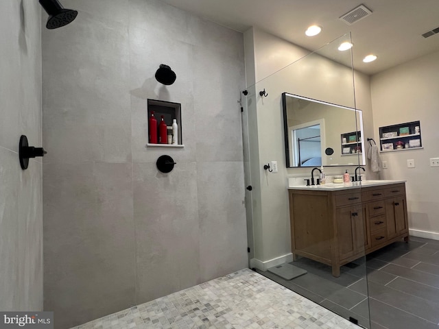 13755 Tides St, Woodbridge, VA 22191 - full bath with tile patterned floors, double vanity, walk in shower, and recessed lighting