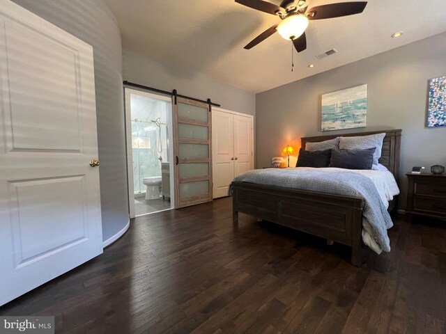 13755 Tides St, Woodbridge, VA 22191 - bedroom featuring a barn door, dark wood finished floors, connected bathroom, recessed lighting, and a ceiling fan