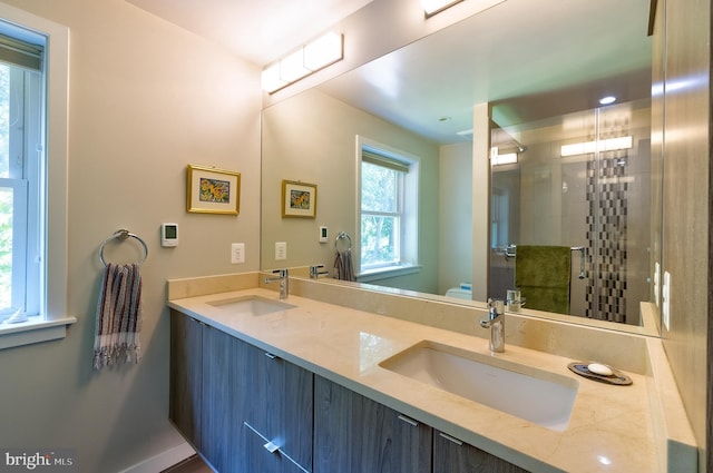 4305 Blagden Ave NW, Washington, DC 20011 - full bathroom featuring double vanity and a stall shower
