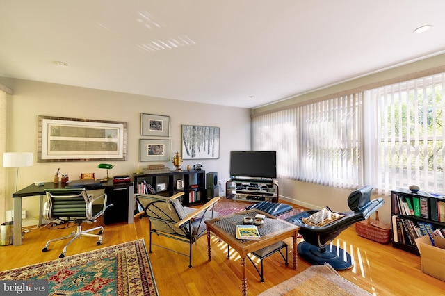 4305 Blagden Ave NW, Washington, DC 20011 - living room with healthy amount of natural light, wood finished floors, and a desk