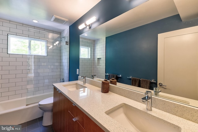 4305 Blagden Ave NW, Washington, DC 20011 - bathroom featuring double vanity, healthy amount of natural light, shower / washtub combination, and tile patterned flooring