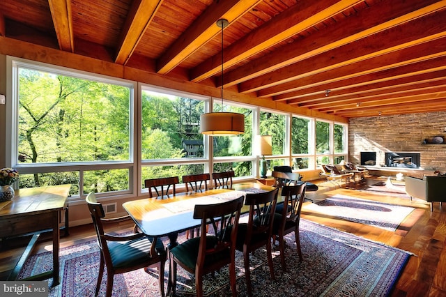 4305 Blagden Ave NW, Washington, DC 20011 - sunroom / solarium with plenty of natural light, beamed ceiling, and wood finished floors