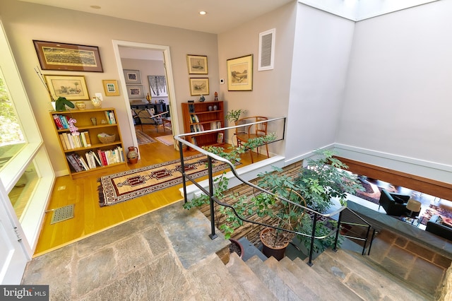 4305 Blagden Ave NW, Washington, DC 20011 - corridor with an upstairs landing, wood finished floors, and recessed lighting