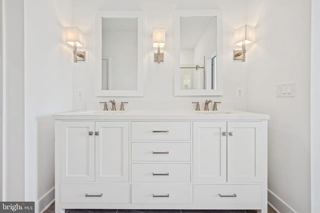 19704 Crows Nest Ct, Georgetown, DE 19947 - full bathroom featuring double vanity and baseboards