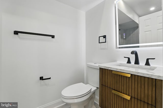 2127 12th Pl NW, Washington, DC 20009 - bathroom featuring baseboards and vanity