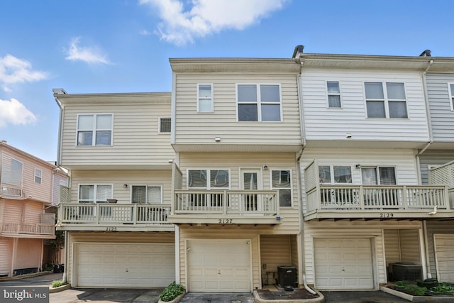 2127 12th Pl NW, Washington, DC 20009 - rear view of property with an attached garage