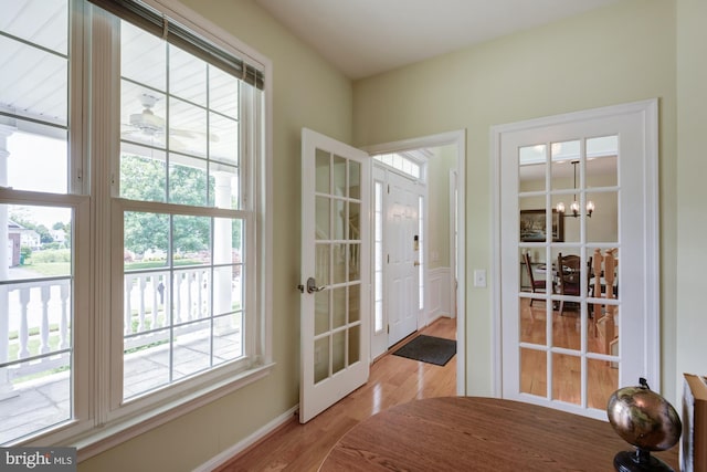 213 Casper Way, Middletown, DE 19709 - doorway featuring light wood-style floors, a chandelier, and french doors