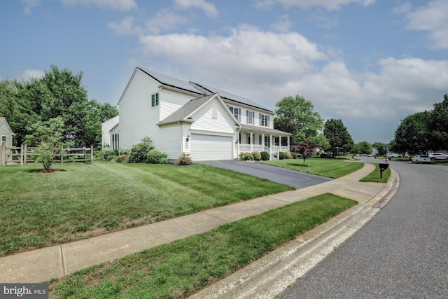 213 Casper Way, Middletown, DE 19709 - traditional-style home featuring solar panels and asphalt driveway