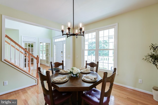 213 Casper Way, Middletown, DE 19709 - dining area featuring a chandelier, healthy amount of natural light, and light wood-style floors