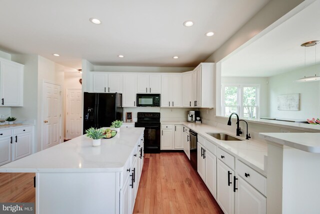 213 Casper Way, Middletown, DE 19709 - kitchen with black appliances, recessed lighting, light countertops, and white cabinets