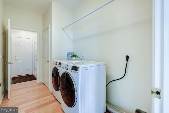 213 Casper Way, Middletown, DE 19709 - washroom with light wood-style flooring and separate washer and dryer