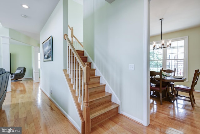 213 Casper Way, Middletown, DE 19709 - stairway featuring hardwood / wood-style floors, a chandelier, and recessed lighting