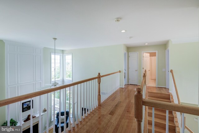 213 Casper Way, Middletown, DE 19709 - corridor with light wood-type flooring, an upstairs landing, and recessed lighting
