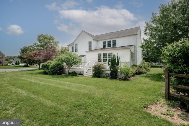 213 Casper Way, Middletown, DE 19709 - rear view of house with a yard and a wooden deck