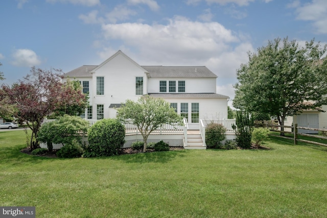 213 Casper Way, Middletown, DE 19709 - rear view of house with a yard and a deck