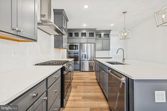 19712 Crows Nest Ct, Georgetown, DE 19947 - kitchen with appliances with stainless steel finishes, a sink, wall chimney exhaust hood, gray cabinets, and recessed lighting