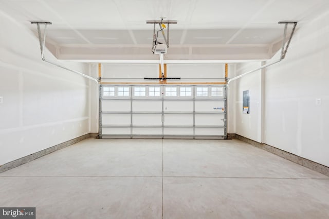19712 Crows Nest Ct, Georgetown, DE 19947 - garage featuring a garage door opener, baseboards, and electric panel