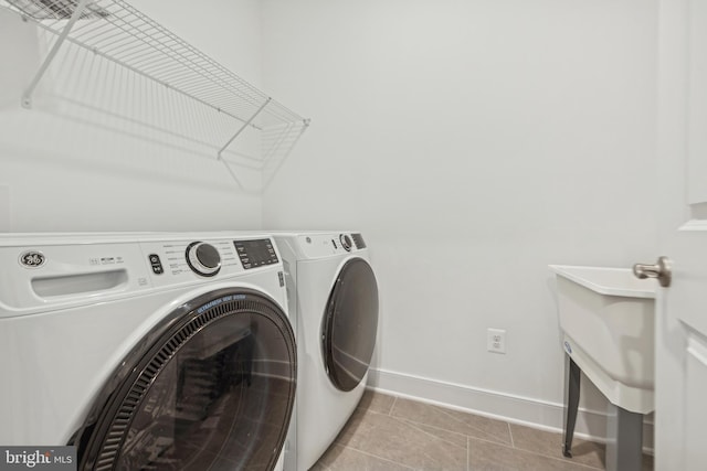 19712 Crows Nest Ct, Georgetown, DE 19947 - laundry area featuring independent washer and dryer and baseboards
