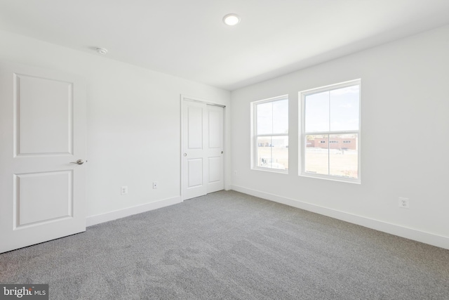 19712 Crows Nest Ct, Georgetown, DE 19947 - unfurnished bedroom featuring carpet floors, baseboards, recessed lighting, and a closet