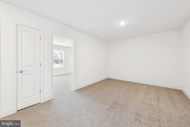 19712 Crows Nest Ct, Georgetown, DE 19947 - carpeted empty room featuring baseboards and recessed lighting