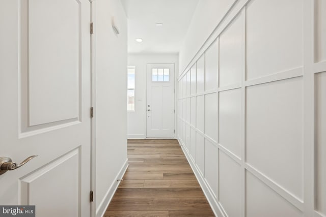 19712 Crows Nest Ct, Georgetown, DE 19947 - hall featuring wood finished floors, baseboards, and recessed lighting