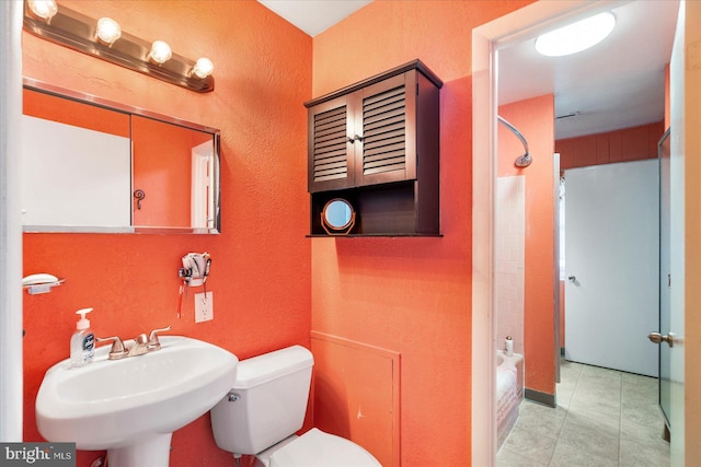 8413 Hallmark Cir, Baltimore, MD 21234 - full bathroom with a textured wall and bathtub / shower combination