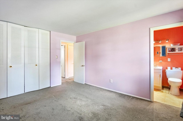 8413 Hallmark Cir, Baltimore, MD 21234 - unfurnished bedroom with carpet, a closet, and connected bathroom