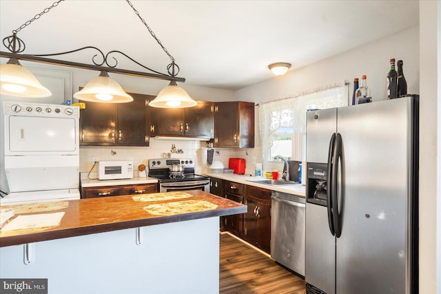 8413 Hallmark Cir, Baltimore, MD 21234 - kitchen with appliances with stainless steel finishes, dark wood-style flooring, tasteful backsplash, and dark brown cabinets